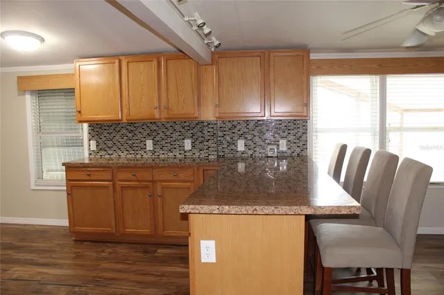 a living room with a couch and a flat screen tv
