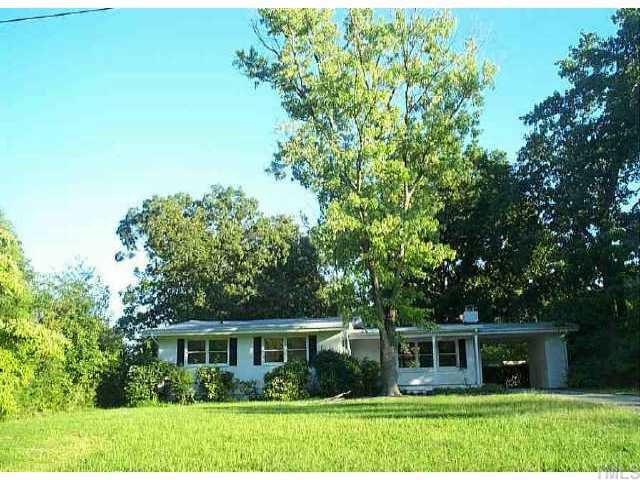 816 Graham Street Raleigh, NC 27605 - Photo 1 of 1 a front view of house with a garden