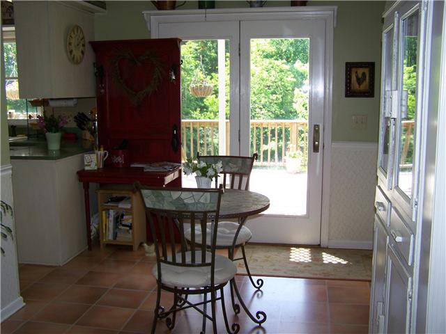 5902 Parham Road Franklin, TN 37064 - Photo 8 of 20 a dining room with furniture and wooden floor