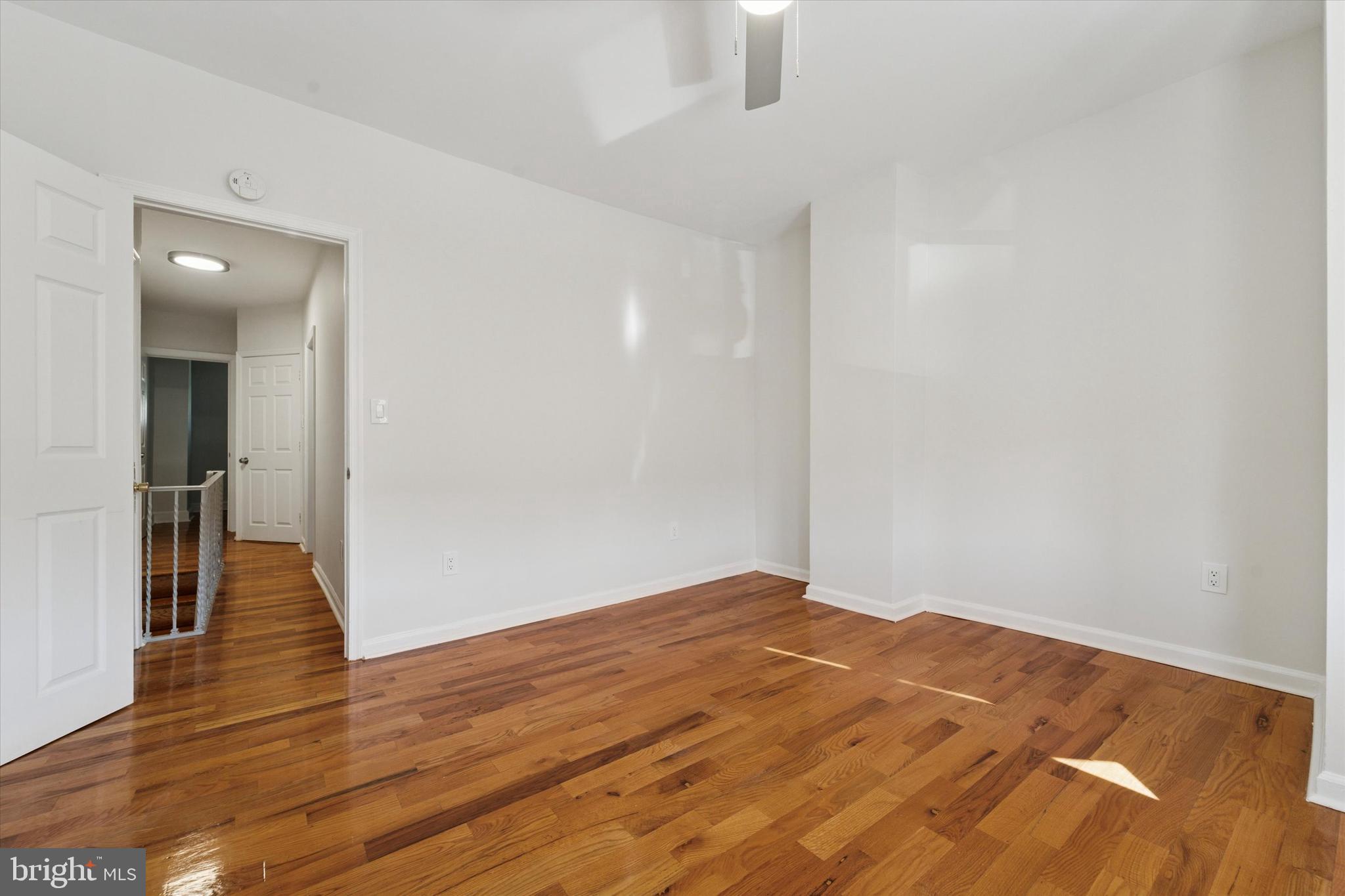 3052 Aramingo Avenue Philadelphia, PA 19134 - Photo 19 of 24 a view of empty room with wooden floor