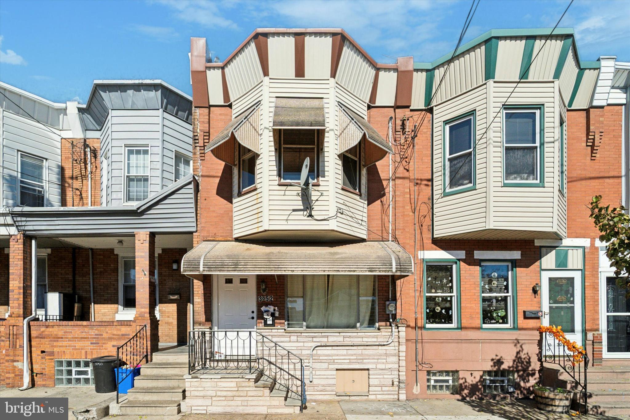 3052 Aramingo Avenue Philadelphia, PA 19134 - Photo 2 of 24 a front view of a residential apartment building