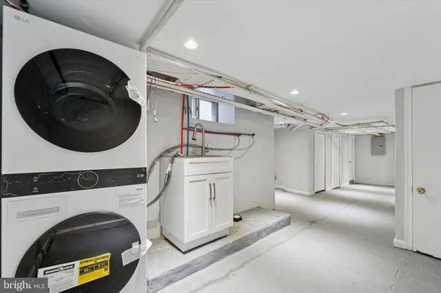 a utility room with dryer and washer