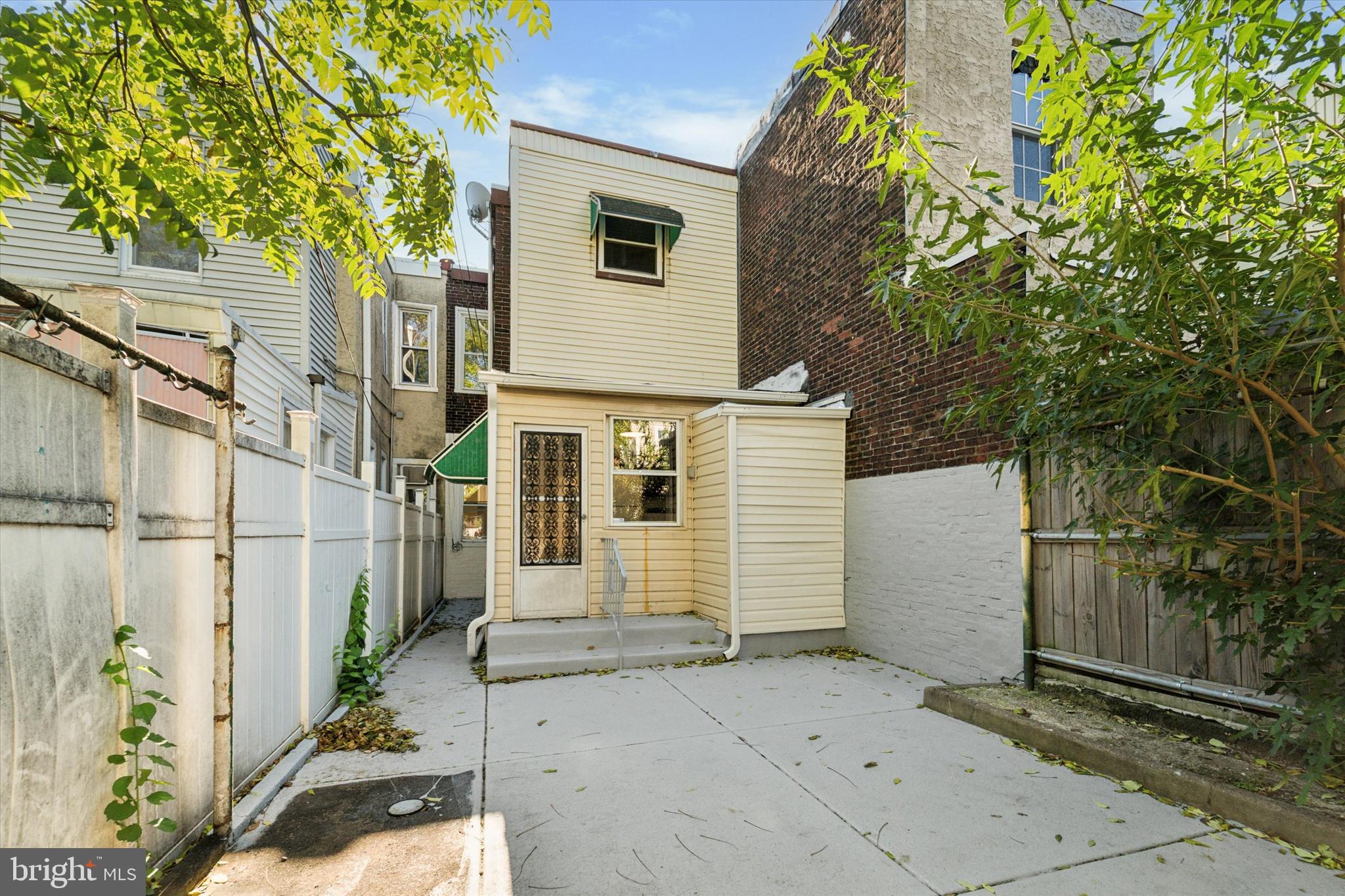 3052 Aramingo Avenue Philadelphia, PA 19134 - Photo 24 of 24 a view of a house with a yard