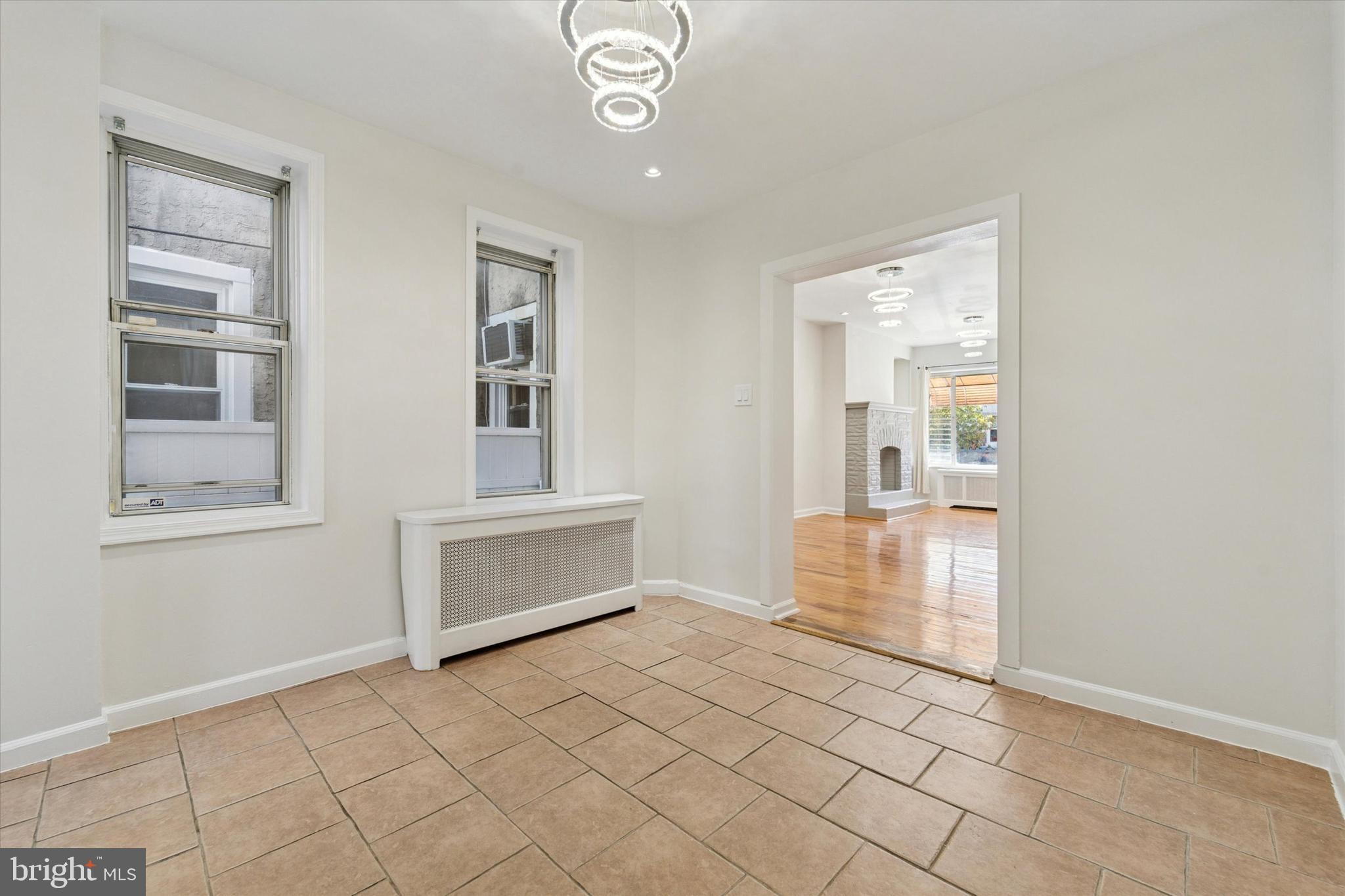 3052 Aramingo Avenue Philadelphia, PA 19134 - Photo 8 of 24 an empty room with windows