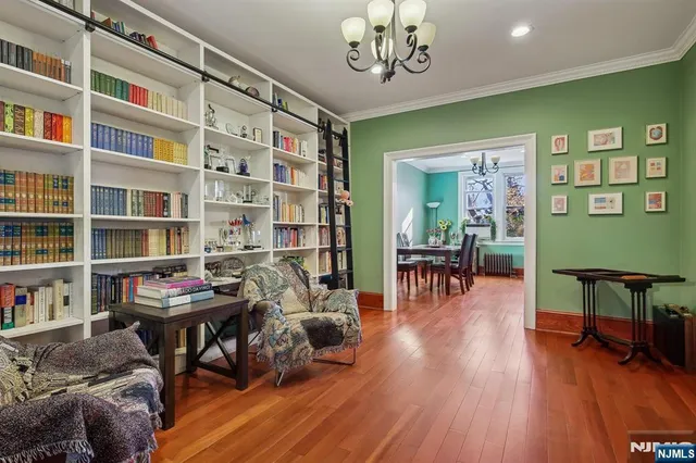 a view of a livingroom with furniture and toys