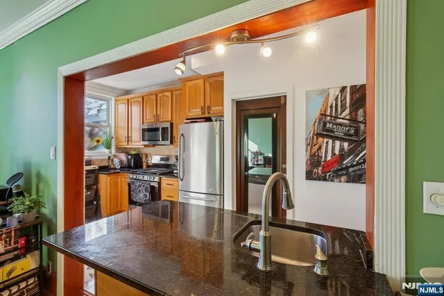 a kitchen with a table and chairs