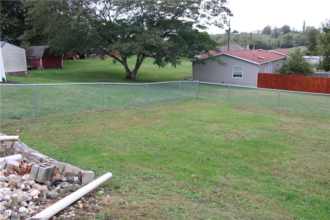 56 3rd Street Rayland, OH 43943 - Photo 10 of 46 View of fenced backyard