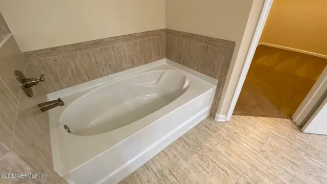 a bathroom with a bathtub