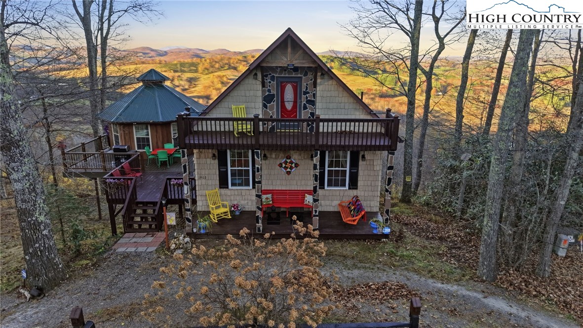 a front view of a house with a porch