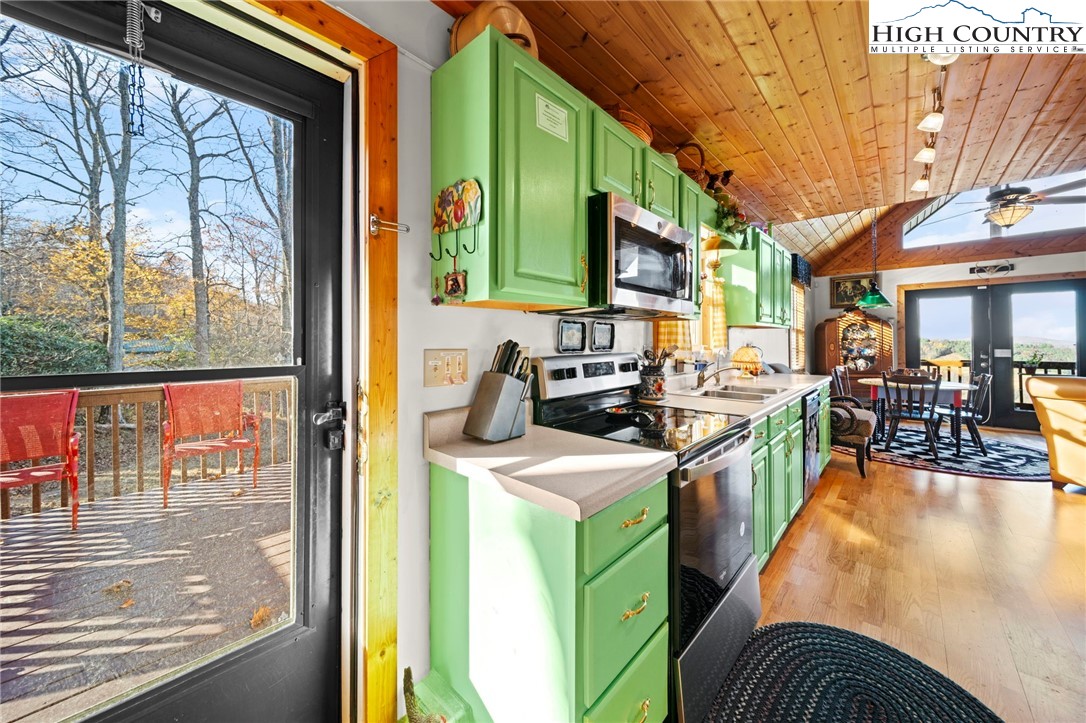 1902 Brown Road Sparta, NC 28675 - Photo 15 of 32 a view of a kitchen with a sink and cabinets