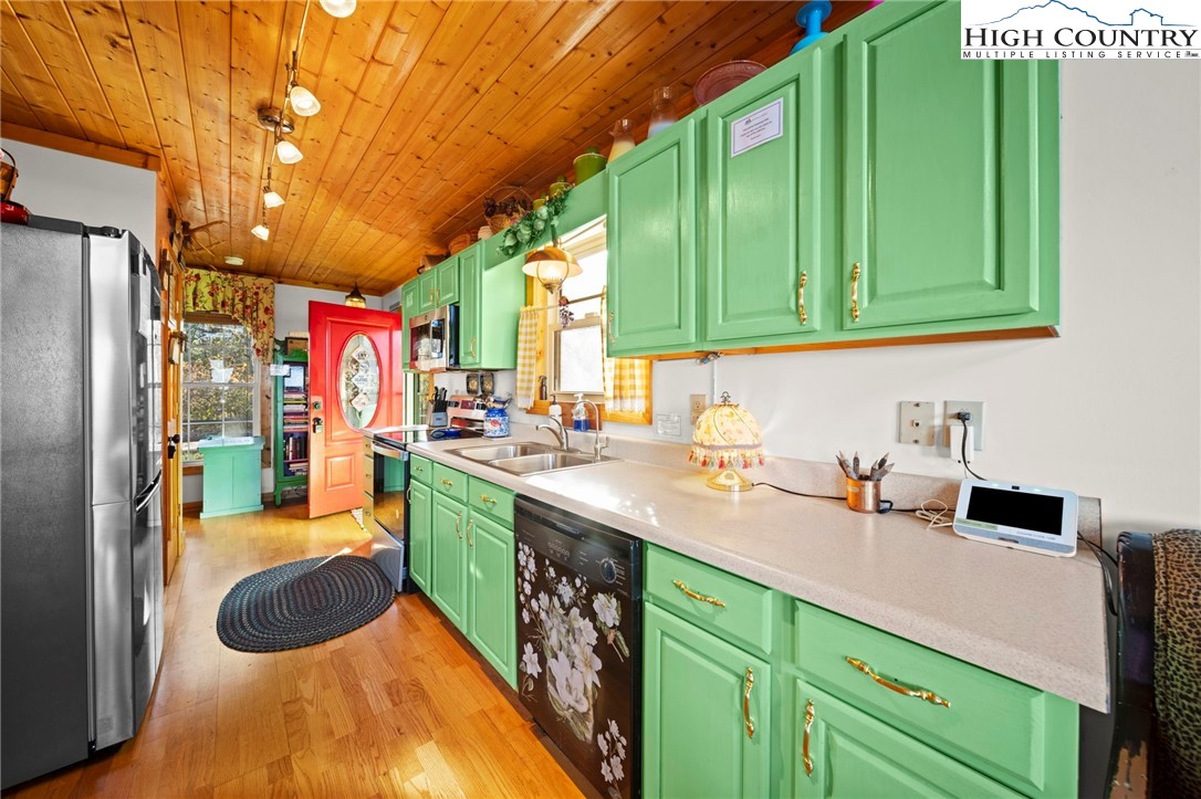 1902 Brown Road Sparta, NC 28675 - Photo 17 of 32 a kitchen with lots of counter space and a sink