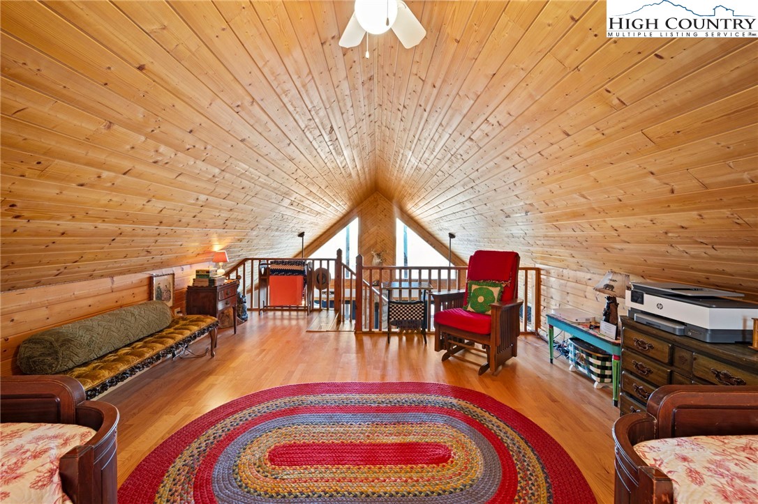 1902 Brown Road Sparta, NC 28675 - Photo 21 of 32 a balcony with furniture and wooden floor