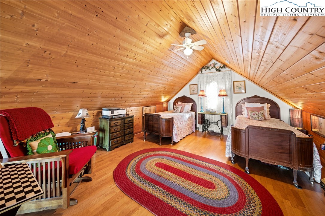 1902 Brown Road Sparta, NC 28675 - Photo 22 of 32 a backyard of a house with barbeque oven table and chairs