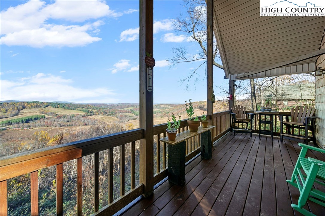 1902 Brown Road Sparta, NC 28675 - Photo 4 of 32 a view of a balcony with wooden floor