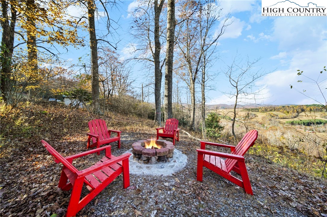 1902 Brown Road Sparta, NC 28675 - Photo 7 of 32 an outdoor sitting area with couch and outdoor seating