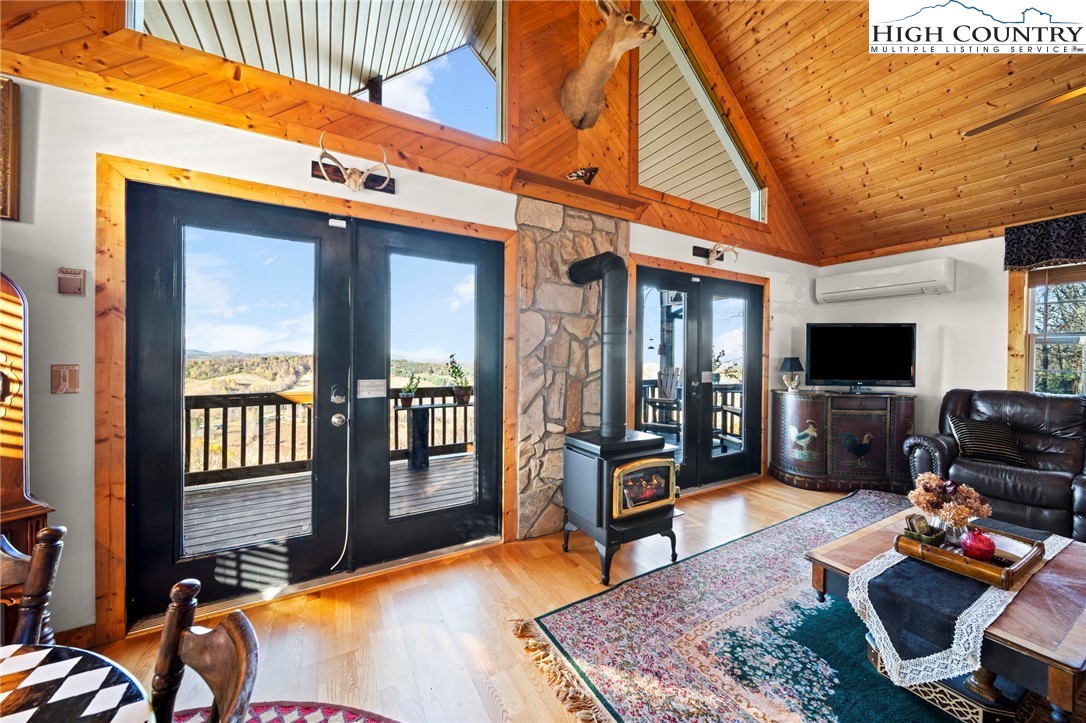 1902 Brown Road Sparta, NC 28675 - Photo 10 of 32 a bedroom with furniture and a flat screen tv