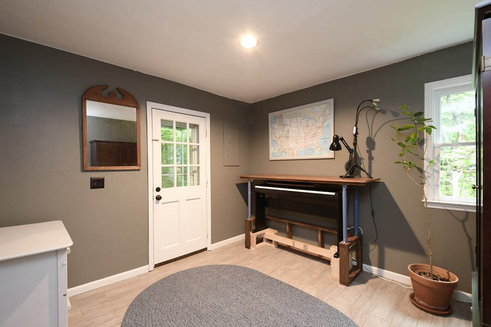 7701 Cresthill Court Raleigh, NC 27615 - Photo 20 of 29 Lower Level Office with access to backyard. Office