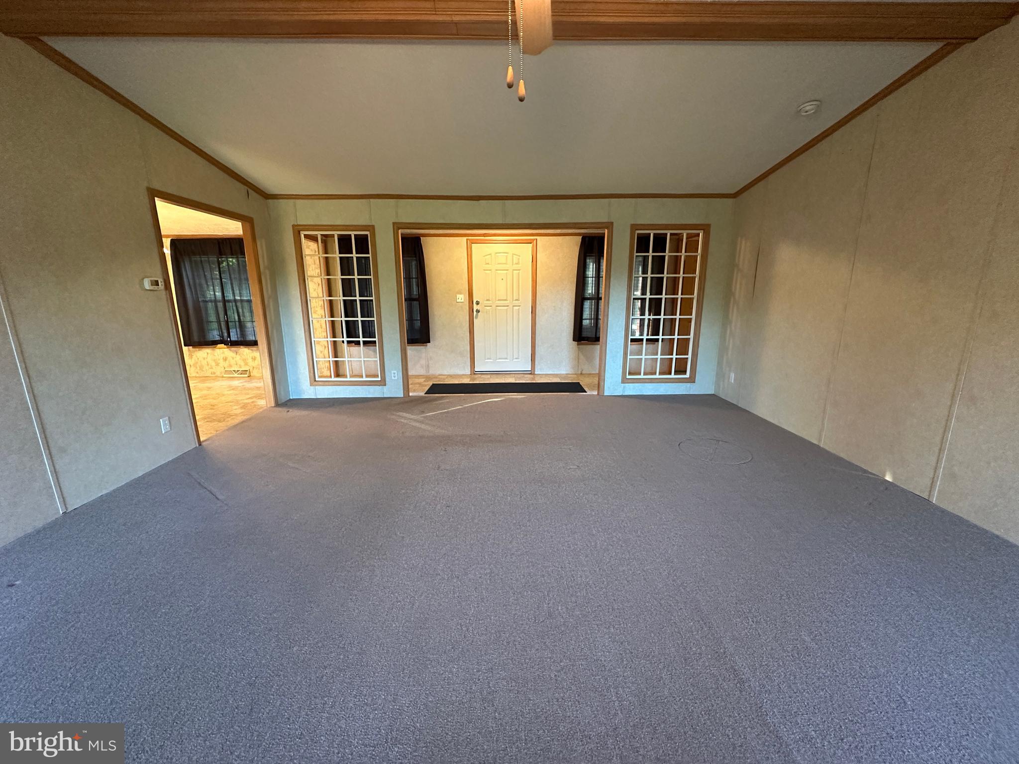 4391 Cito Road McConnellsburg, PA 17233 - Photo 34 of 67 a view of a big room with windows and chandelier