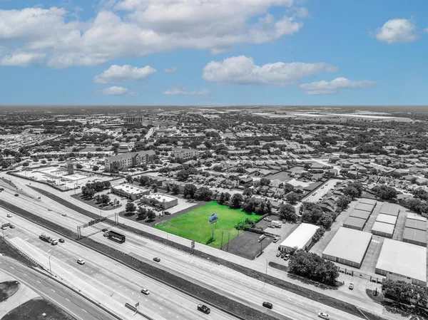 an aerial view of residential building and city view