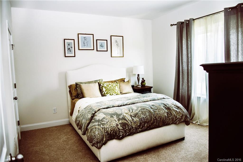 8086 Clems Branch Road Indian Land, SC 29707 - Photo 19 of 23 a bedroom with a bed and a window