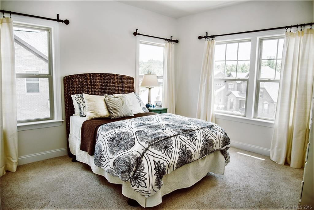 8086 Clems Branch Road Indian Land, SC 29707 - Photo 20 of 23 a bedroom with a bed and a window