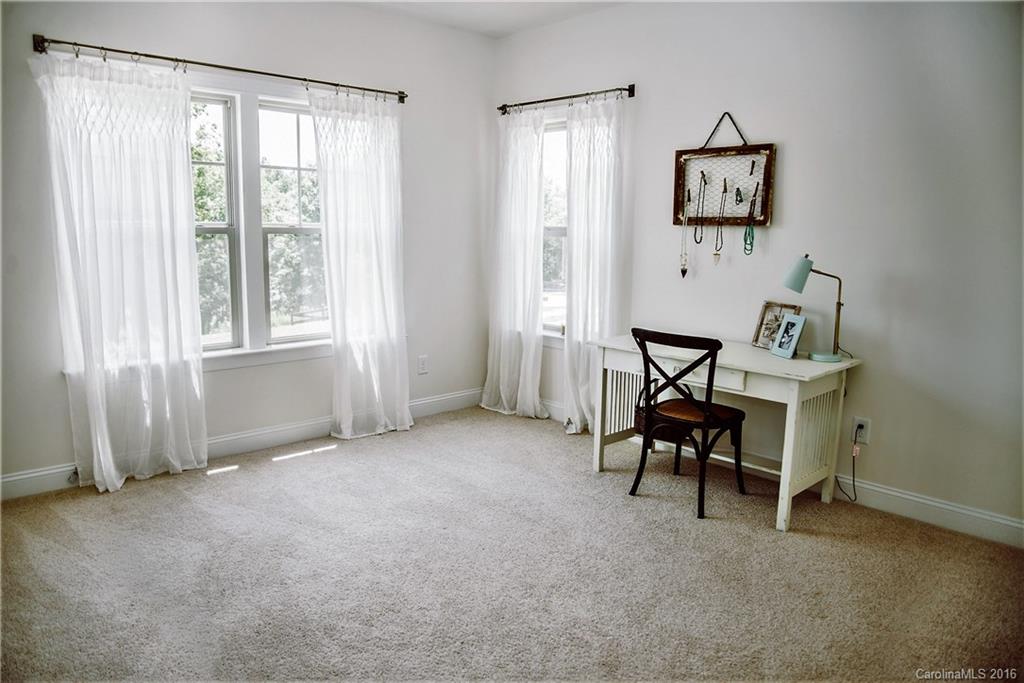 8086 Clems Branch Road Indian Land, SC 29707 - Photo 21 of 23 a view of an empty room with window and workspace