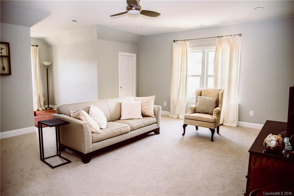 8086 Clems Branch Road Indian Land, SC 29707 - Photo 22 of 23 a living room with furniture and a window