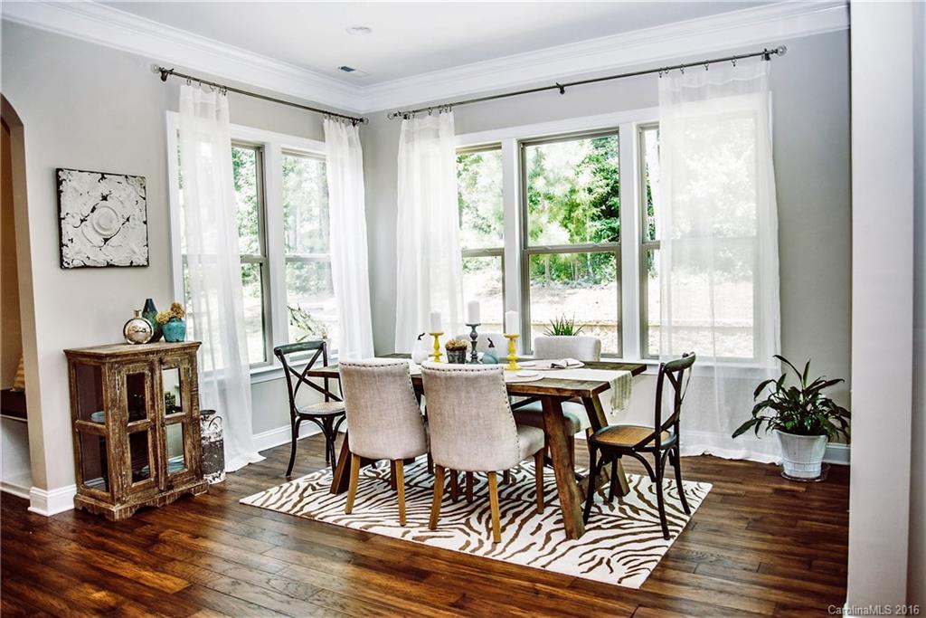 8086 Clems Branch Road Indian Land, SC 29707 - Photo 8 of 23 a view of a dining room with furniture window and outside view