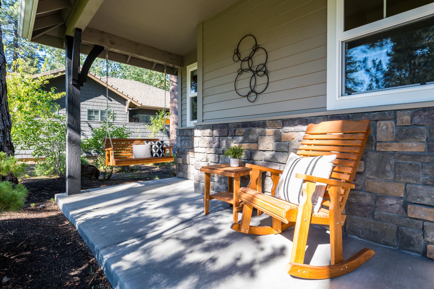 60819 Currant Way Bend, OR 97702 - Photo 5 of 44 The welcoming front porch is a perfect place for your morning coffee.