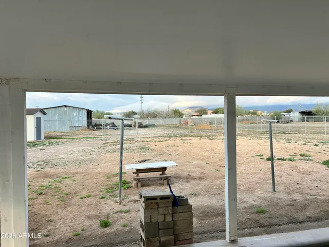 a view of a balcony with chairs