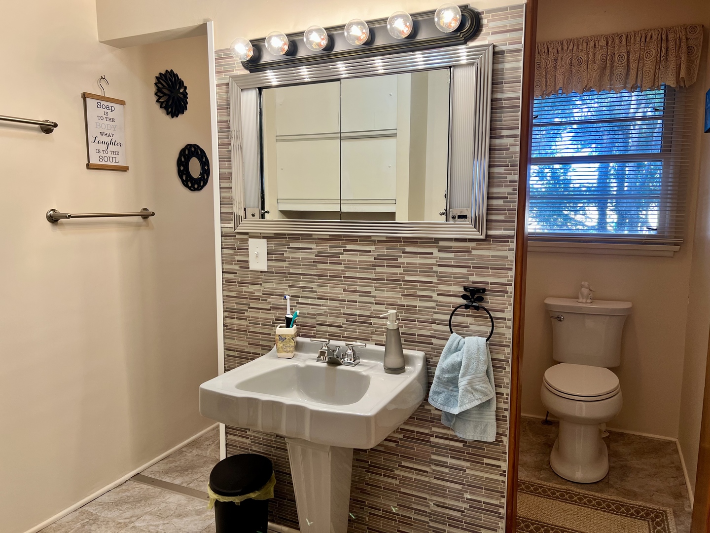 2102 County Road 2900 North Rantoul, IL 61866 - Photo 26 of 34 a bathroom with a sink a toilet and shower