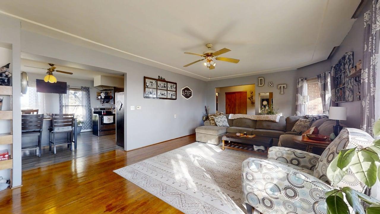 2102 County Road 2900 North Rantoul, IL 61866 - Photo 5 of 34 a living room with furniture and wooden floor
