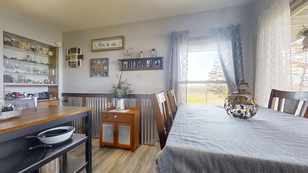 2102 County Road 2900 North Rantoul, IL 61866 - Photo 9 of 34 a bedroom with furniture and a wooden floor