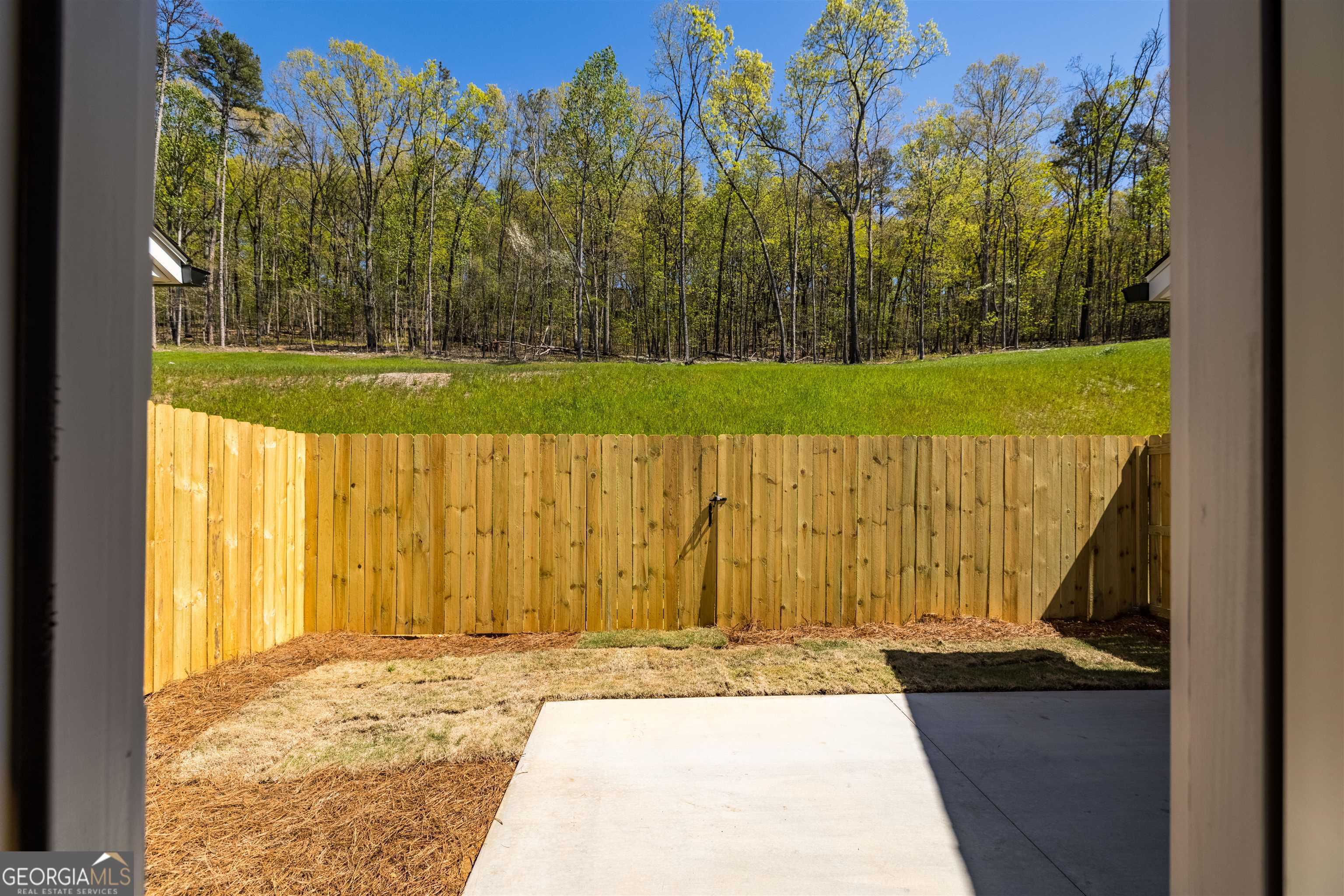 81 Chateau Drive Southeast Rome, GA 30161 - Photo 31 of 32 a view of a backyard of the house