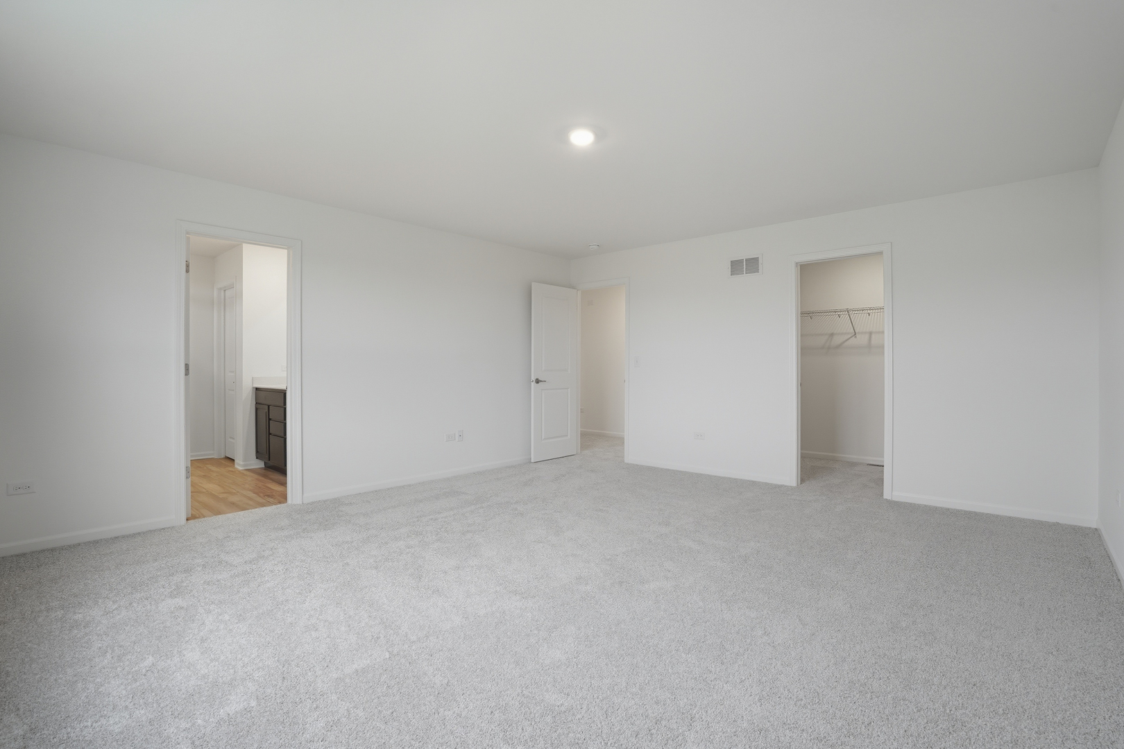 357 Danforth Drive Oswego, IL 60543 - Photo 11 of 22 a view of an empty room with a closet