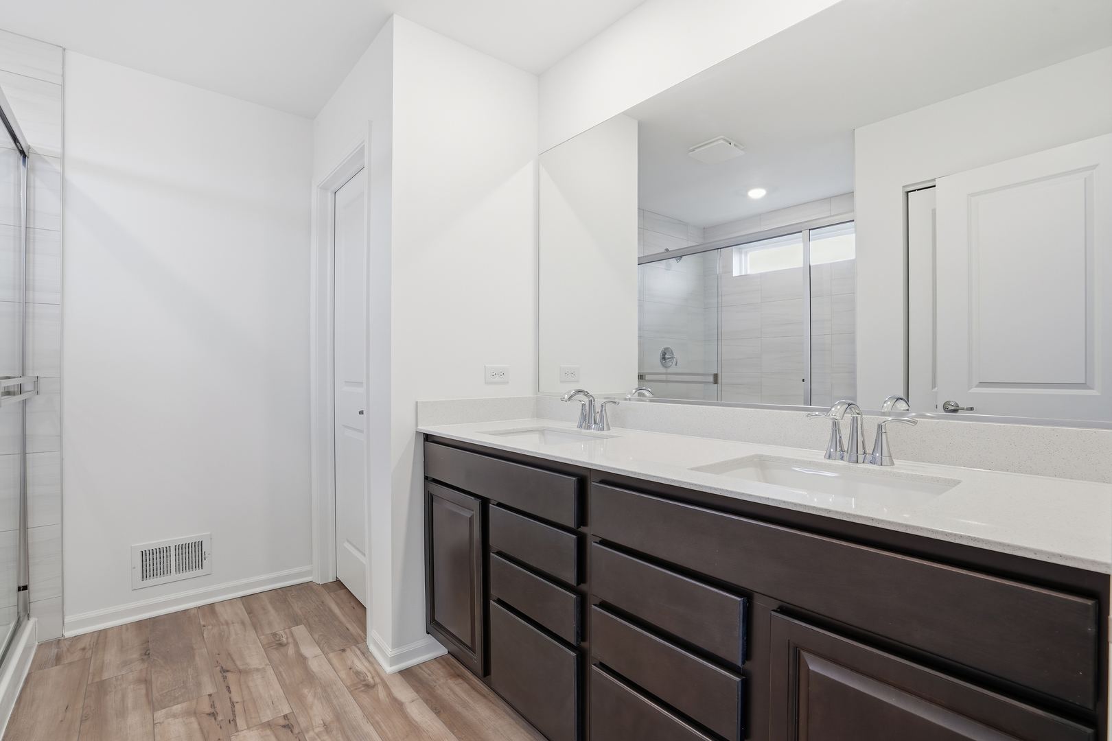 357 Danforth Drive Oswego, IL 60543 - Photo 12 of 22 a bathroom with a sink and a mirror