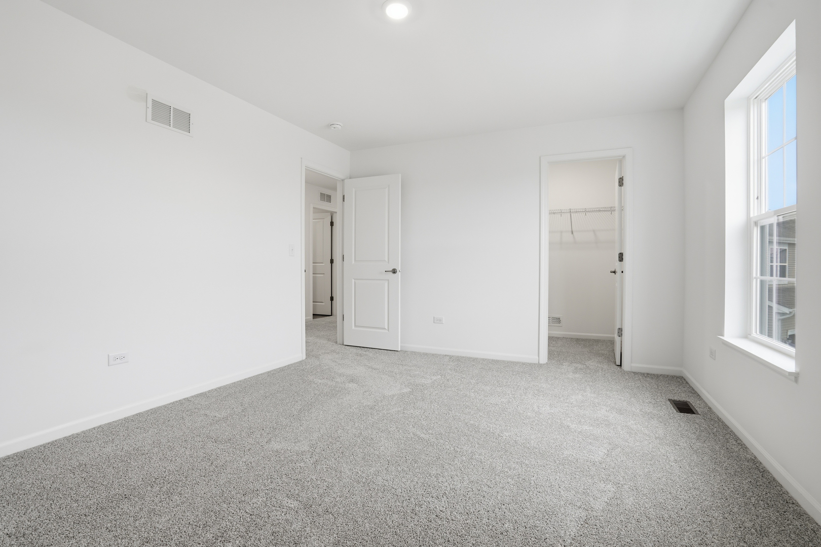 357 Danforth Drive Oswego, IL 60543 - Photo 15 of 22 a view of an empty room with a window