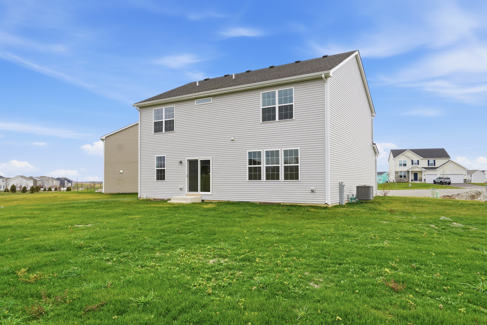 357 Danforth Drive Oswego, IL 60543 - Photo 2 of 22 a view of a house with backyard