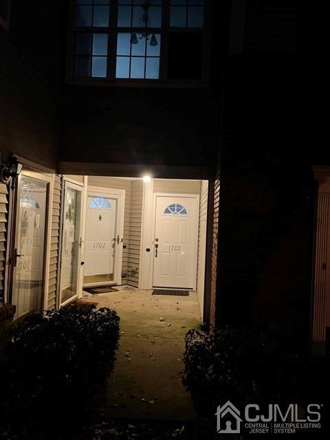 a front view of a house with a backyard