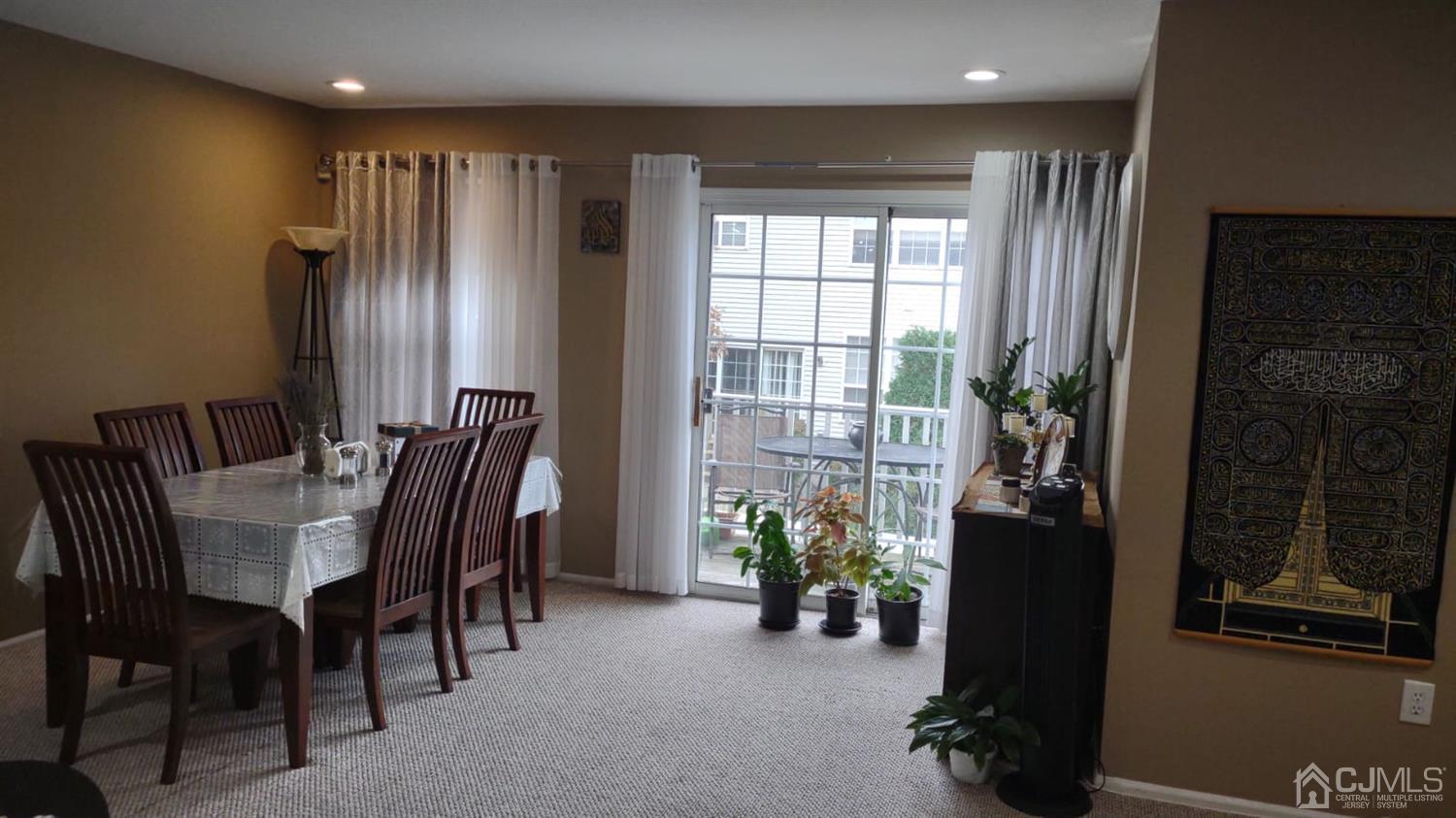 1707 Ridgeview Court Sayreville, NJ 08859 - Photo 5 of 25 a view of a dining room with furniture and a window