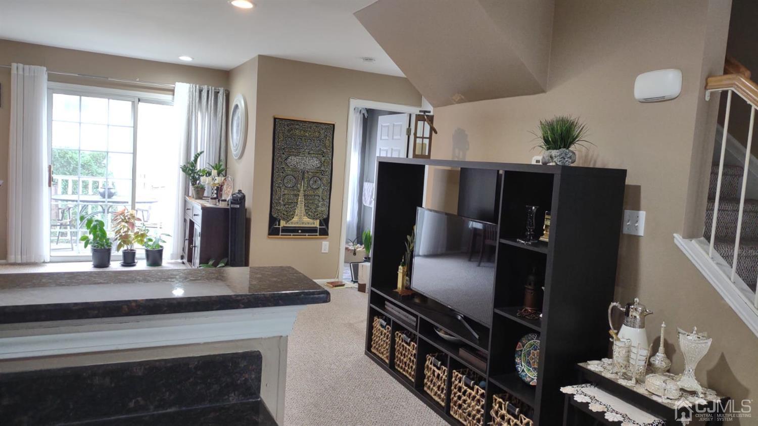 1707 Ridgeview Court Sayreville, NJ 08859 - Photo 6 of 25 a kitchen with sink refrigerator and window