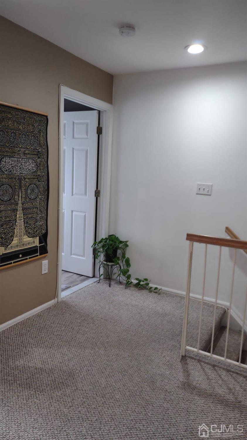 1707 Ridgeview Court Sayreville, NJ 08859 - Photo 9 of 25 a view of an empty room with a window