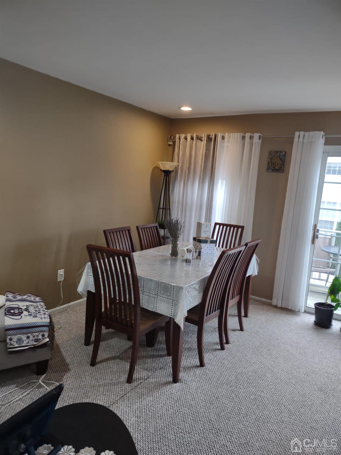 1707 Ridgeview Court Sayreville, NJ 08859 - Photo 10 of 25 a view of a dining room with furniture and window