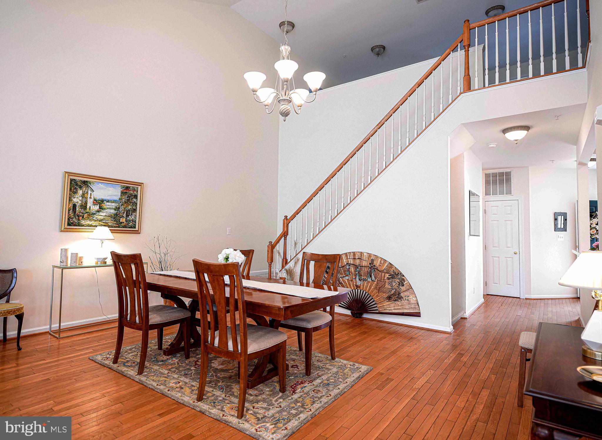 316 Native Dancer Circle Havre de Grace, MD 21078 - Photo 14 of 54 a view of a dining room with furniture and wooden floor