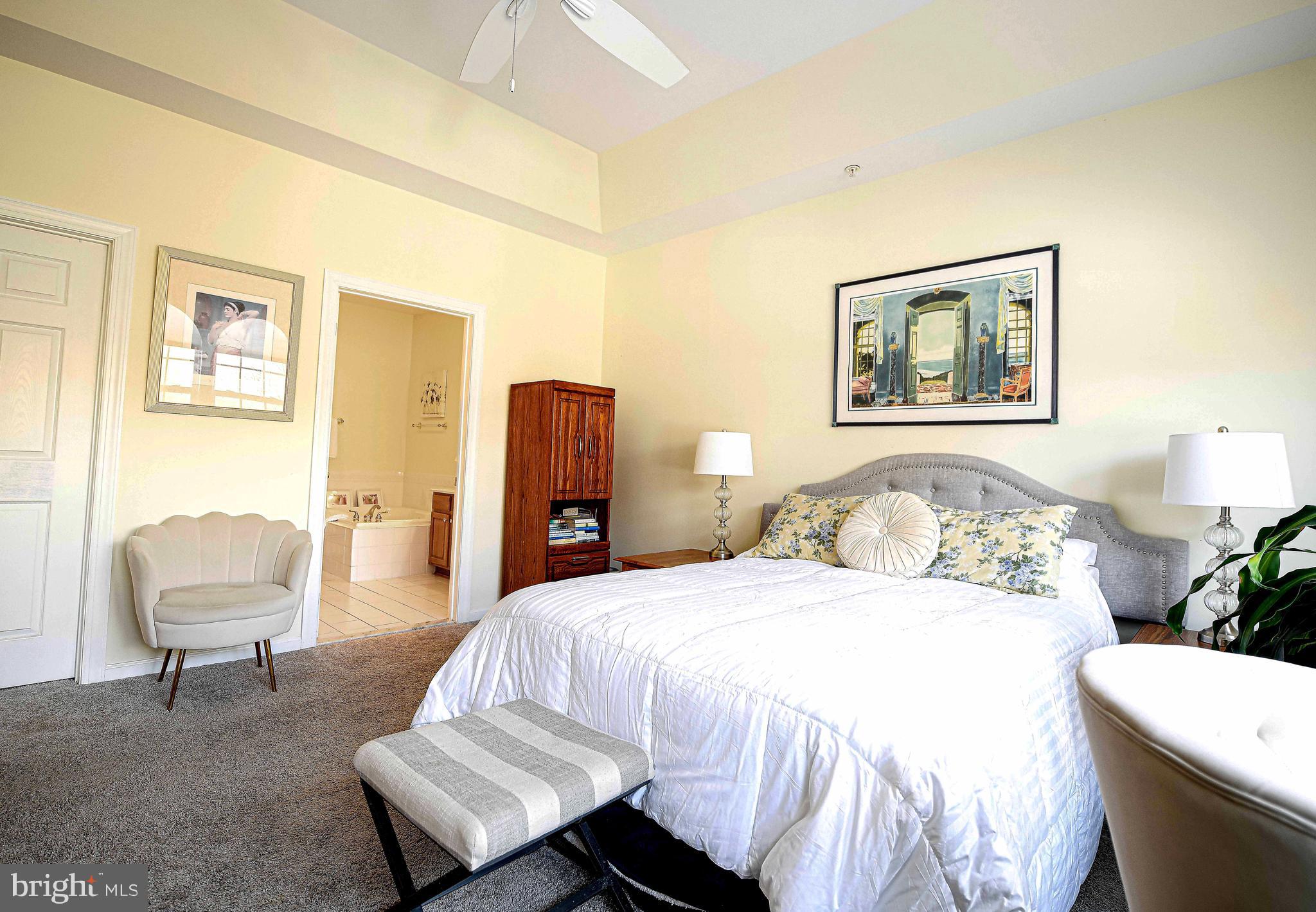 316 Native Dancer Circle Havre de Grace, MD 21078 - Photo 18 of 54 a bedroom with a bed and a chair