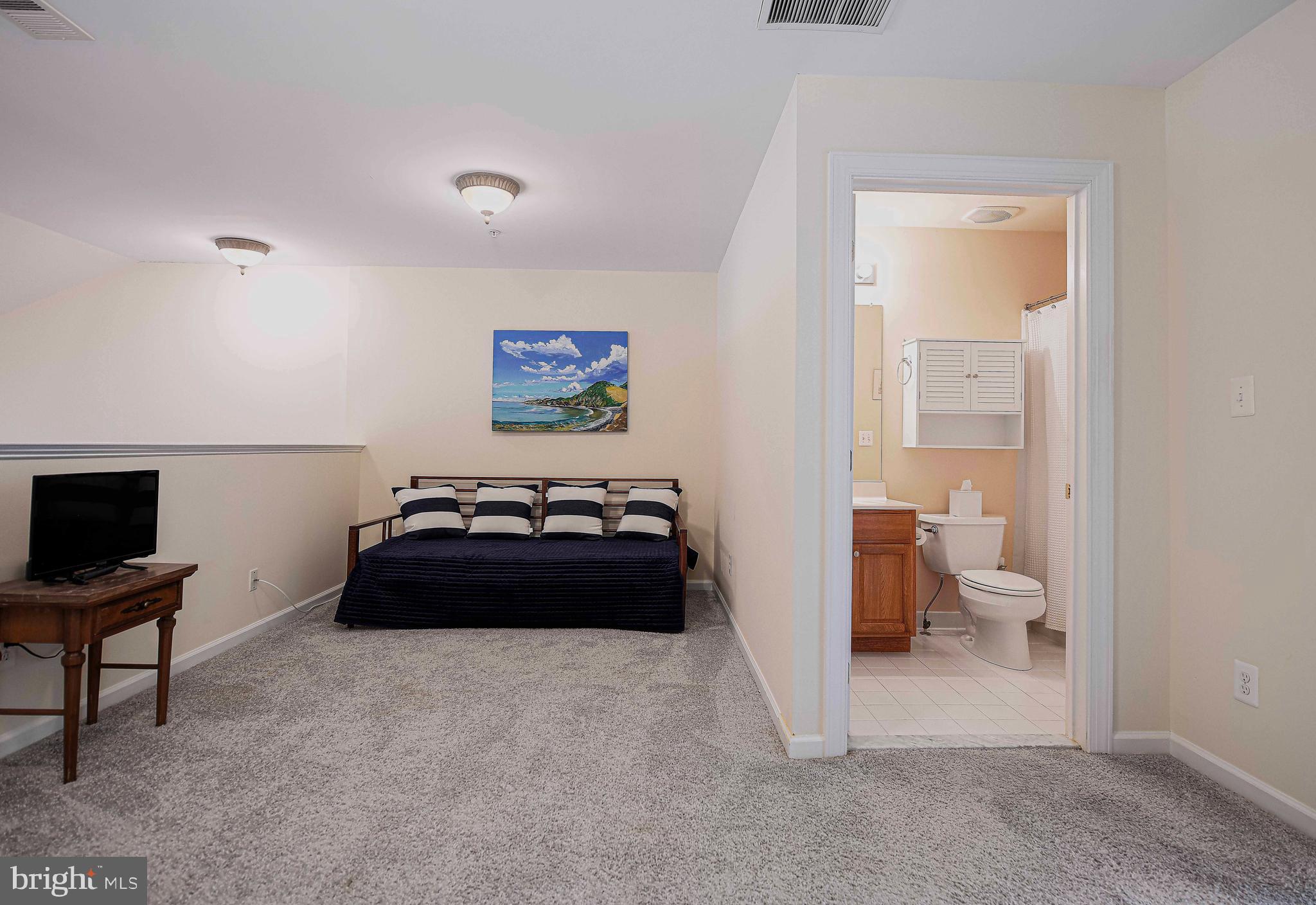 316 Native Dancer Circle Havre de Grace, MD 21078 - Photo 24 of 54 a bedroom with a bed and a workspace