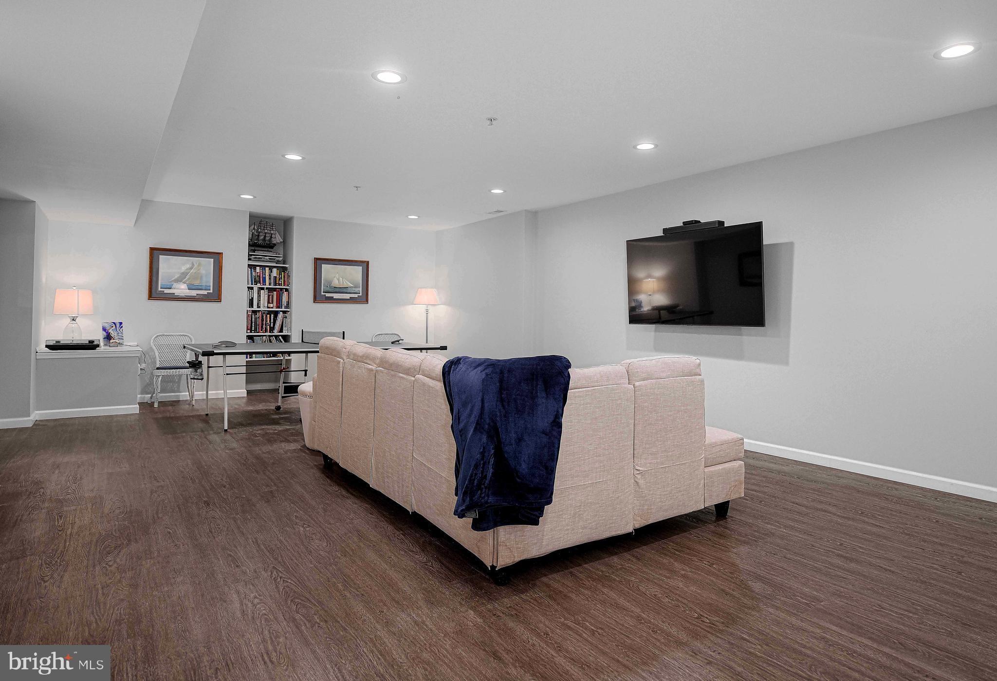 316 Native Dancer Circle Havre de Grace, MD 21078 - Photo 28 of 54 a living room with furniture and a flat screen tv