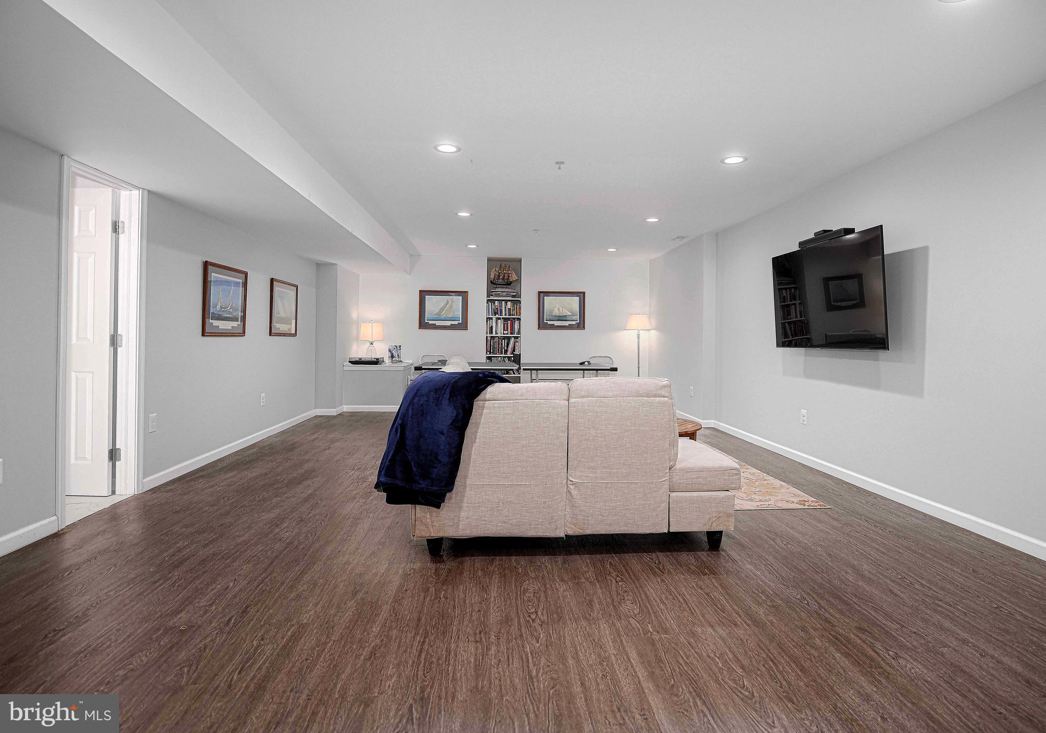316 Native Dancer Circle Havre de Grace, MD 21078 - Photo 29 of 54 a spacious bedroom with a bed and a flat screen tv