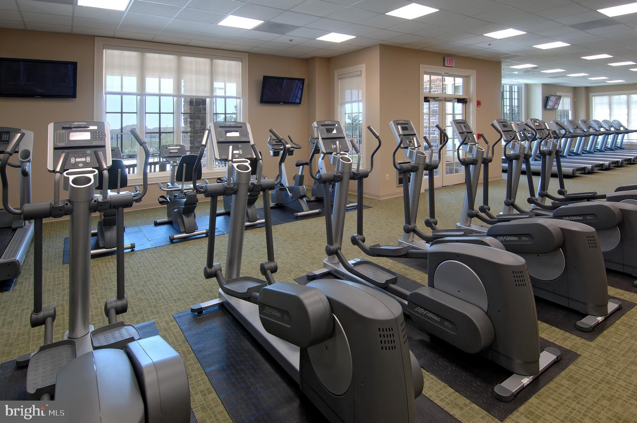 316 Native Dancer Circle Havre de Grace, MD 21078 - Photo 51 of 54 a room with gym equipment and a flat screen tv