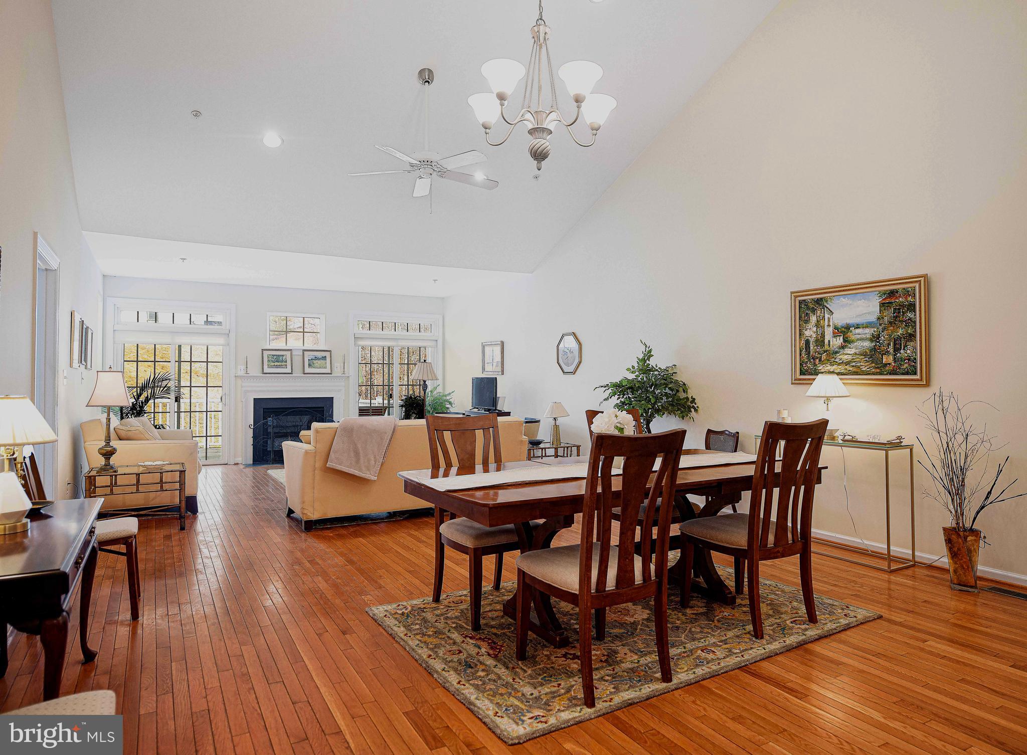316 Native Dancer Circle Havre de Grace, MD 21078 - Photo 9 of 54 a view of a dining room with furniture wooden floor and a chandelier